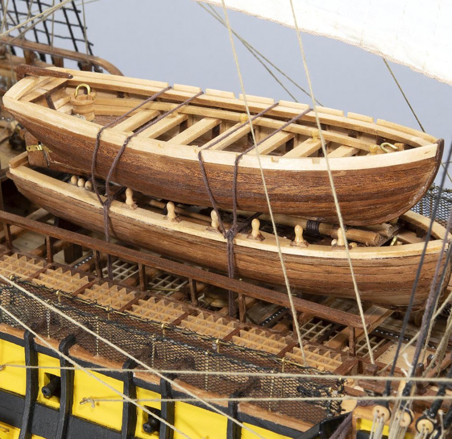 The previous metal lifeboats have been replaced with a more realistic wooden construction.